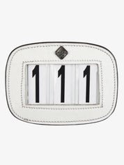 Front view of the LeMieux Saddle Number Holder in White showing numbers 111