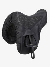 Angled side view of the black dressage LeMieux Ride On Saddle Cover over a saddle