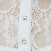 Close-up view of the rhinestone buttons on the white Equinavia Lisa Lace Long Sleeve Show Shirt