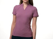 Video of a female model posing in front of a white background while wearing the purple LeMieux Lisa Mesh Short Sleeve Base Layer