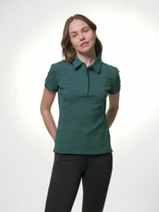 LeMieux Pixie polo shirt in jungle green with pointed collar, partial button placket, sleeve piping, and LeMieux logo on the chest, shown in a video of a model changing poses to show the fit and details against a light gray background.