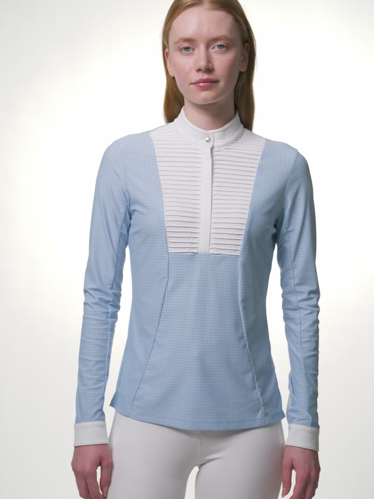 Video of model wearing LeMieux Arielle Long Sleeve Show Shirt in Mist demonstrating white stand collar and pleated bib front details