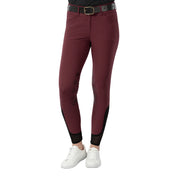 Front view of a model wearing the wine red Equinavia Maud Knee Patch Breeches on a white background