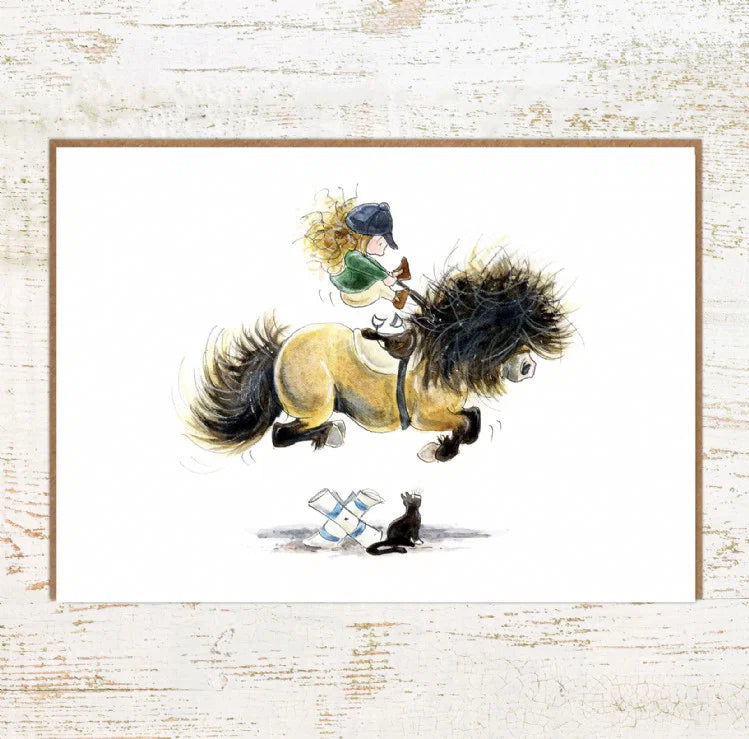 View of the Cat Leap Pony Nut Greeting Card on a white washed wood background