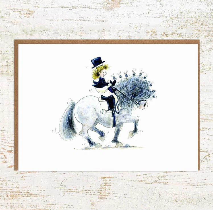 View of the Piaffe Pony Nut Greeting Card on a white washed wood background