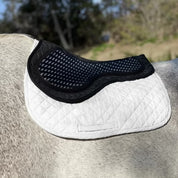 Majyk Equipe Contact-X Half Pad placed on a white saddle pad