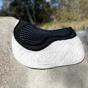 Majyk Equipe Contact-X Half Pad placed on a white saddle pad