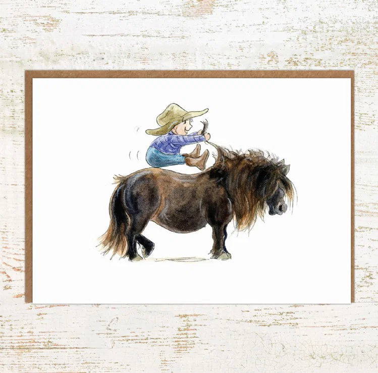 View of the Where's The Go Button Pony Nut Greeting Card on a white washed wood background