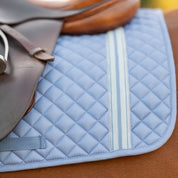 Side closeup view of a horse wearing Dusk Blue Equinavia Harstad Ribbon All Purpose Pad