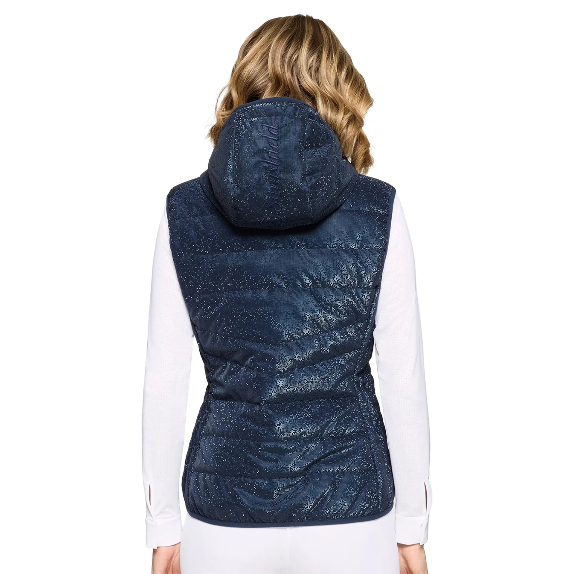 Back view of a female model wearing the Ice Navy Samshield Alta Badia Vest on a plain background