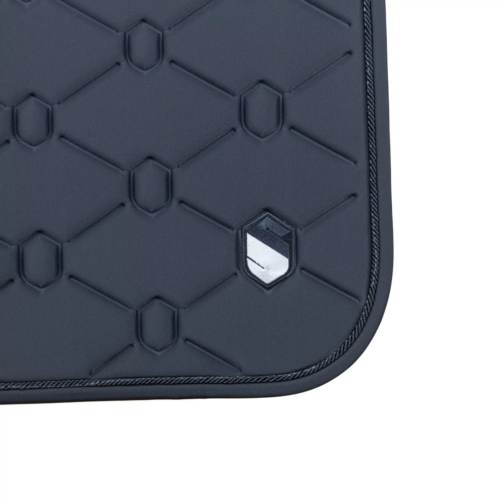 Close-up side view of the anthracite embroidered Samshield Spineshield Jump Pad on a white background