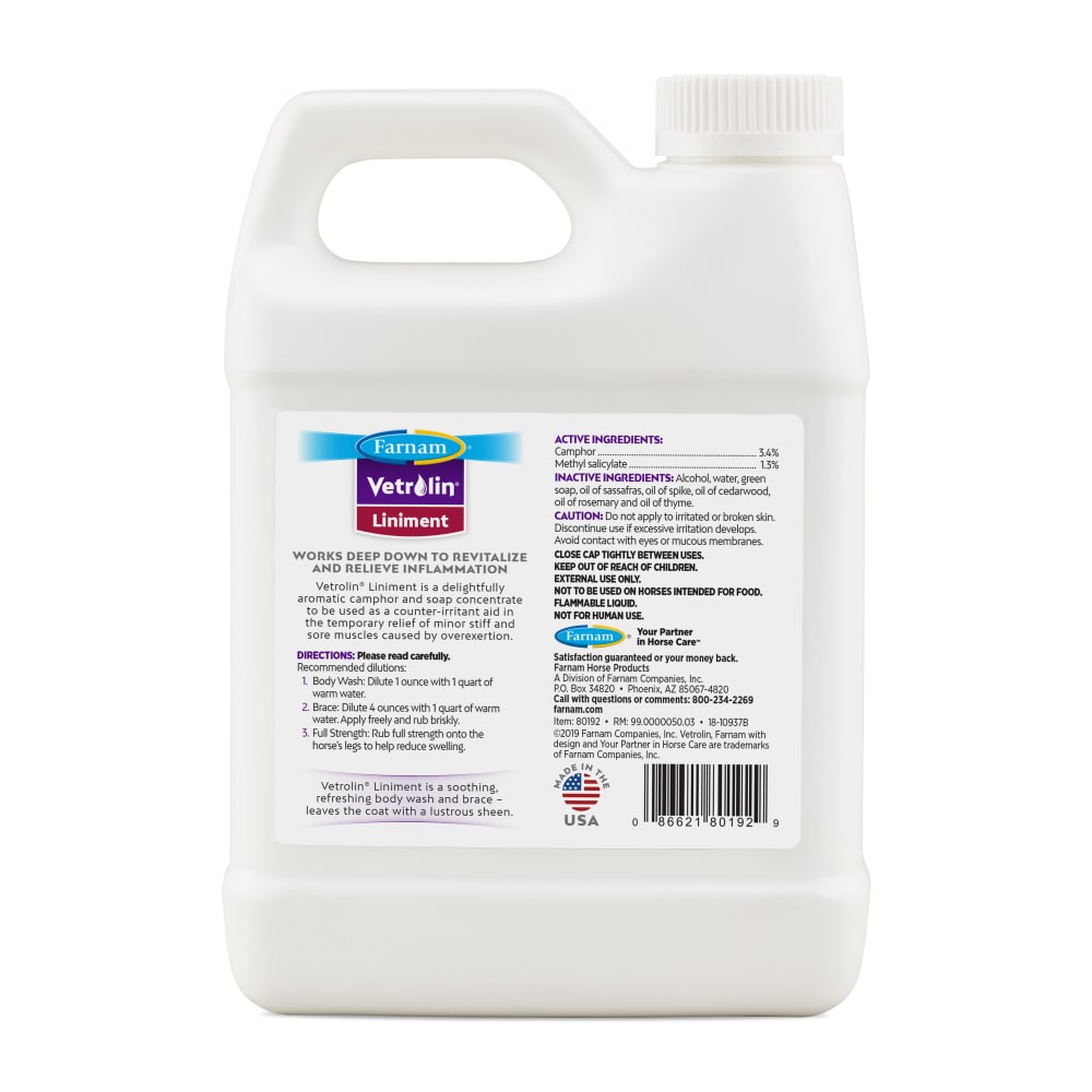 Back view of a 32 oz jug of Farnam Vetrolin Liniment on a white background