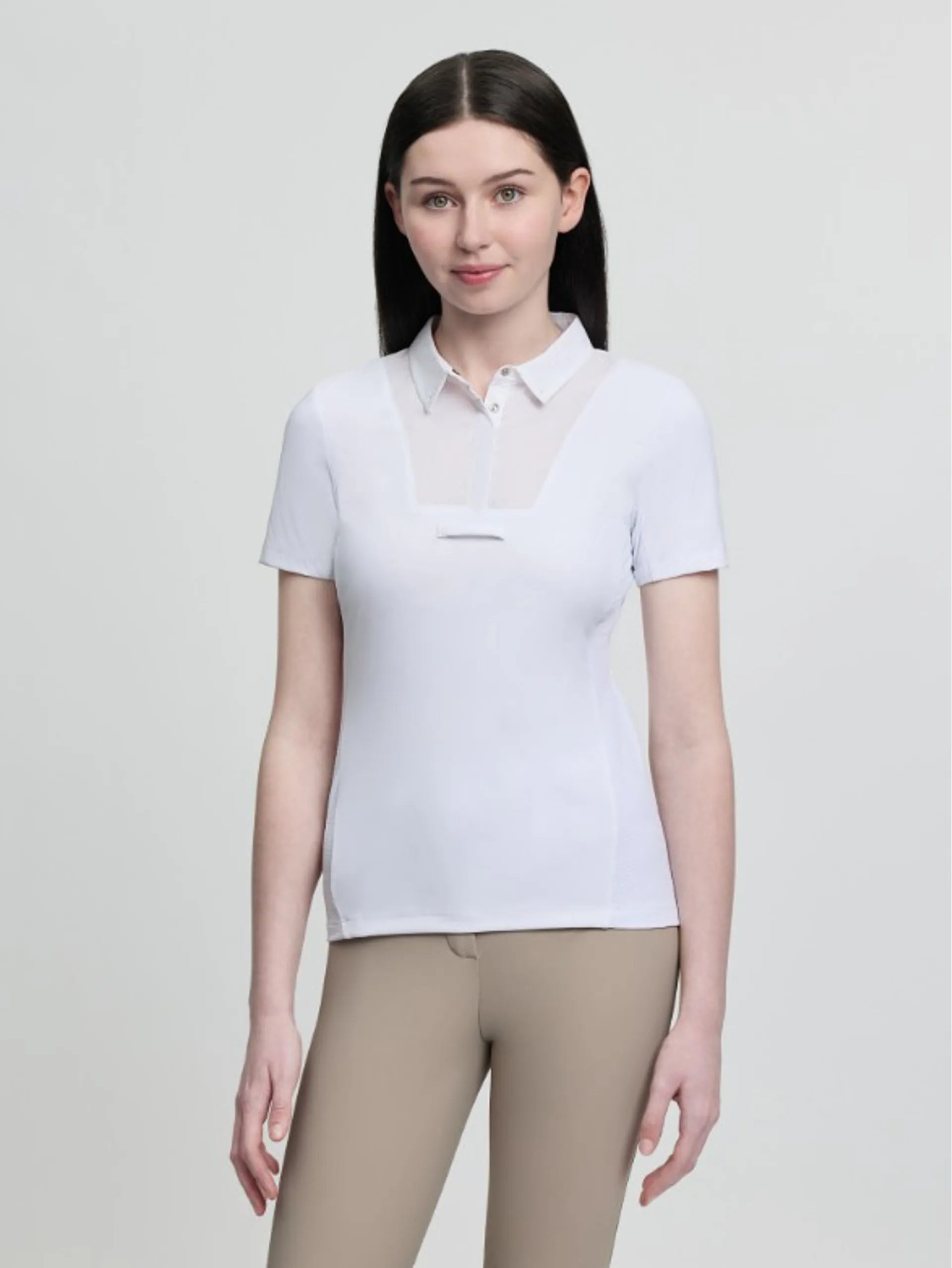 LeMieux Junior Short Sleeve Primrose Show Shirt in white, front view worn with beige breeches
