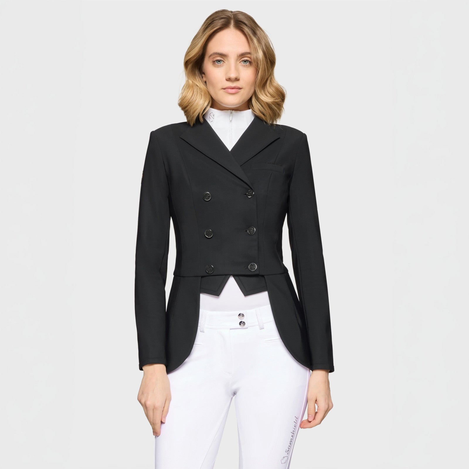 Front view of a female model wearing the Black Samshield Short Frac Crystal Fabric Show Coat on a plain background