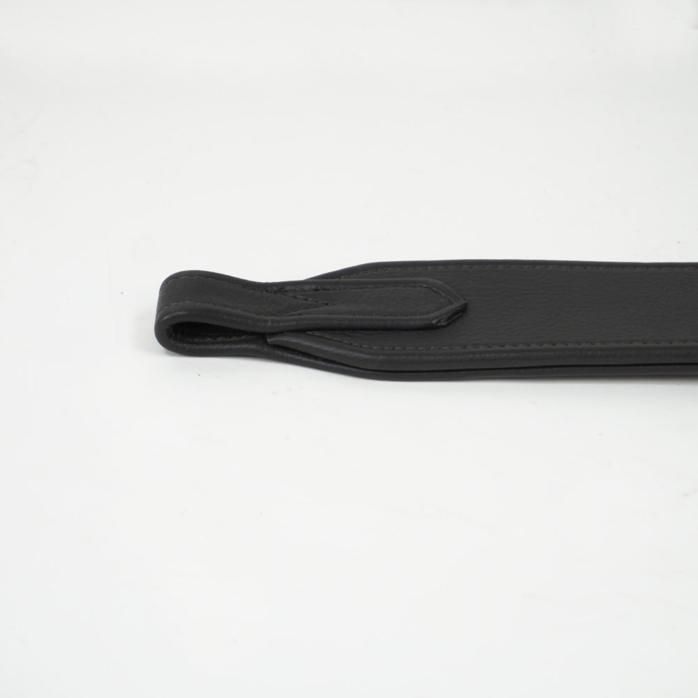 Close-up view of the saddle attachment on the brown Total Saddle Fit Slim Stability Stirrup Leather on a white background
