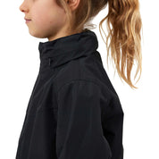 Close up side view of the navy Horze Fiora Kids Lightweight Waterproof Jacket on a white background