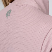 Back closeup view of a model wearing Mellow Rose Equinavia Juni Short Sleeve Quarter Zip Shirt showing detail on a plain background