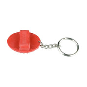 Top view of the red Horze Brush Key Chain on a white background