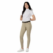 Full body front view of a model wearing the tan Horze Grand Prix Silicone Knee Patch Breeches and white shirt on a white background