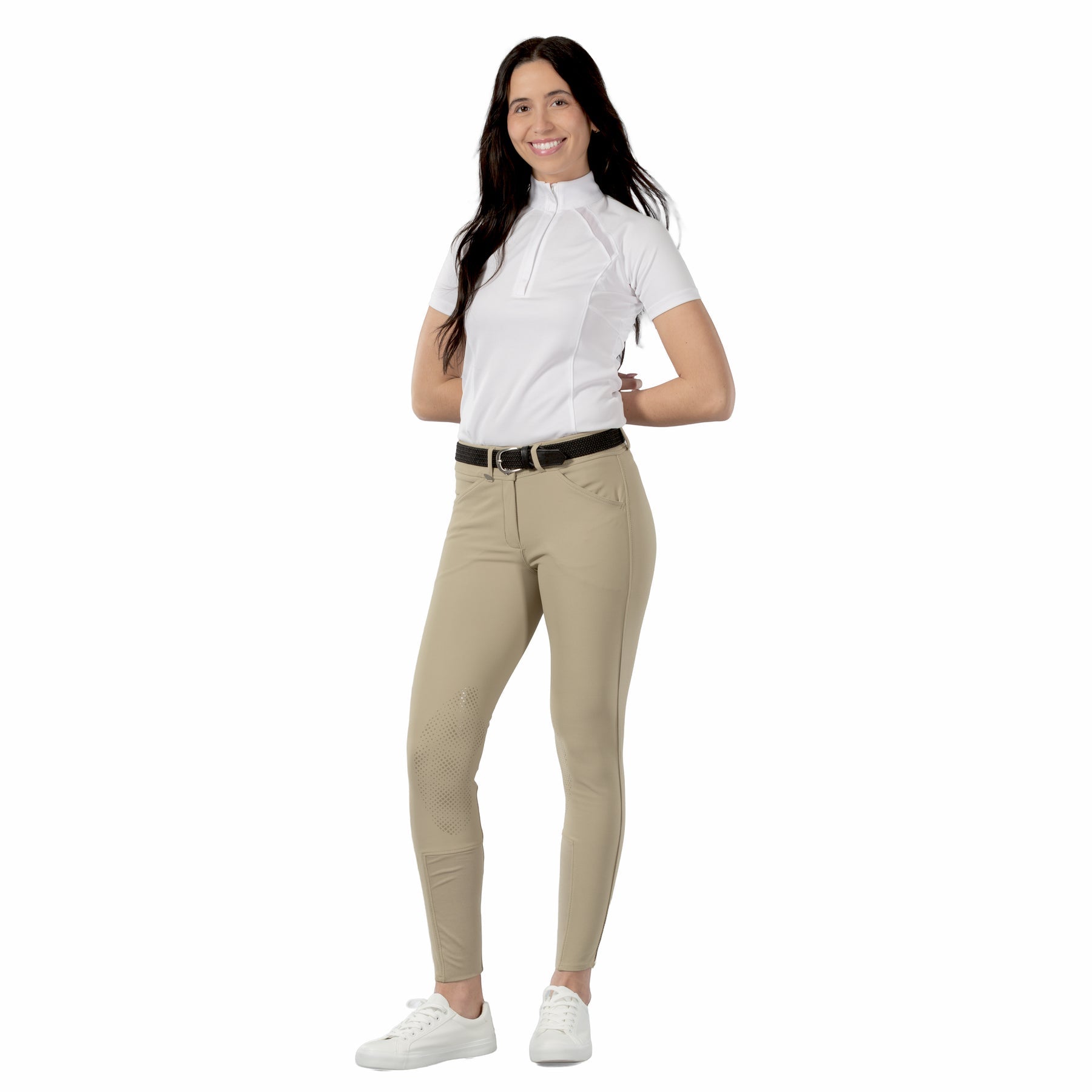 Full body front view of a model wearing the tan Horze Grand Prix Silicone Knee Patch Breeches and white shirt on a white background