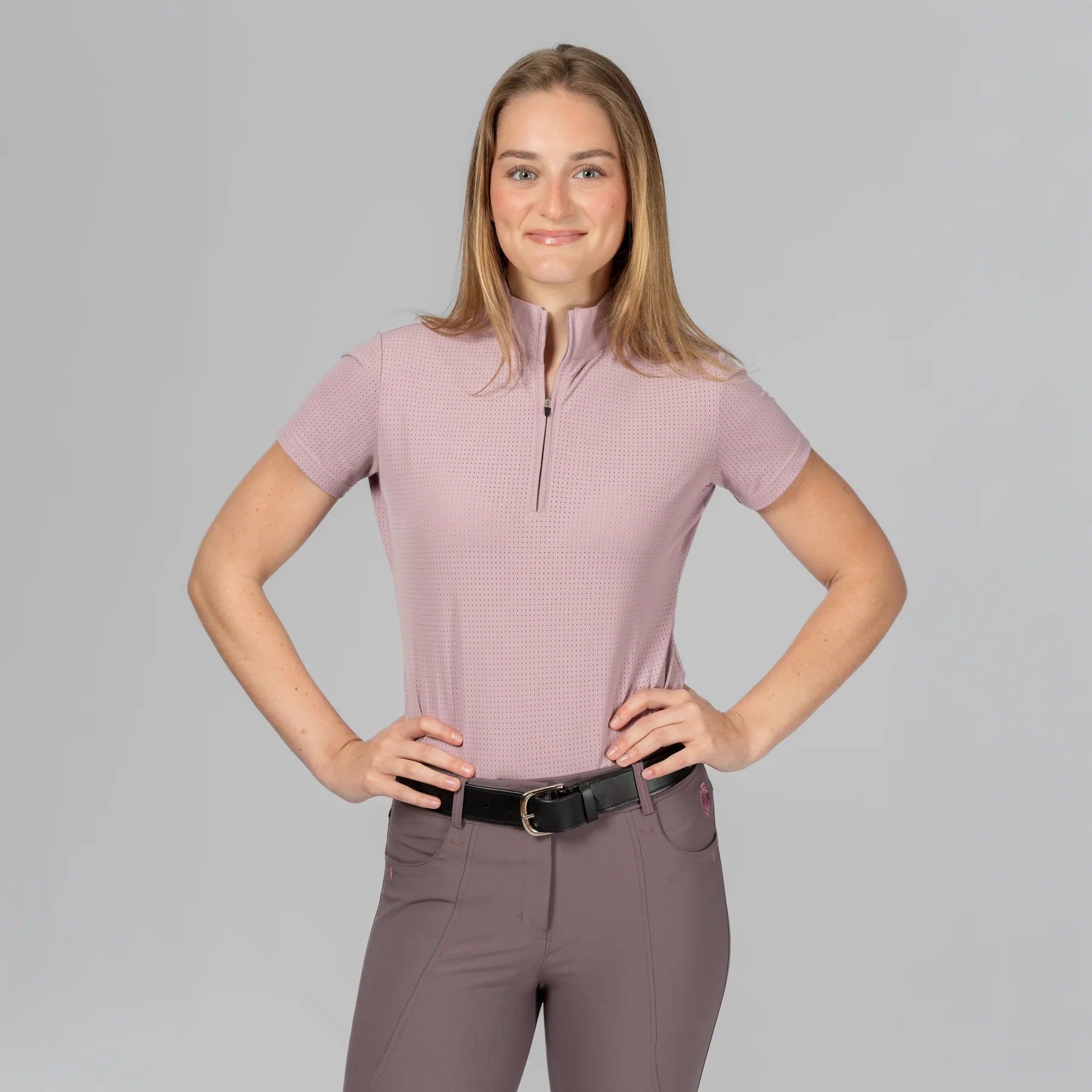 Front view of a model wearing Mellow Rose Equinavia Juni Short Sleeve Quarter Zip Shirt on a plain background