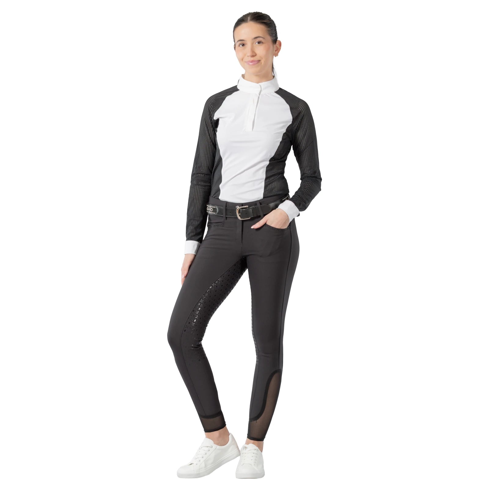 Full body front view of a female model wearing the black Equinavia Victoria Full Seat Breeches with white and black shirt on a white background