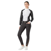 Full body front view of a female model wearing the black Equinavia Victoria Full Seat Breeches with white and black shirt on a white background