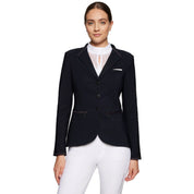 Front view of a female model wearing the black Samshield Victorine Show Coat on a white background