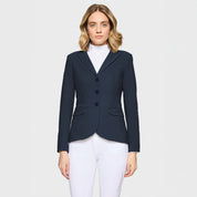 Front view of a female model wearing the Navy Samshield Victory Premium Show Jacket on a plain background