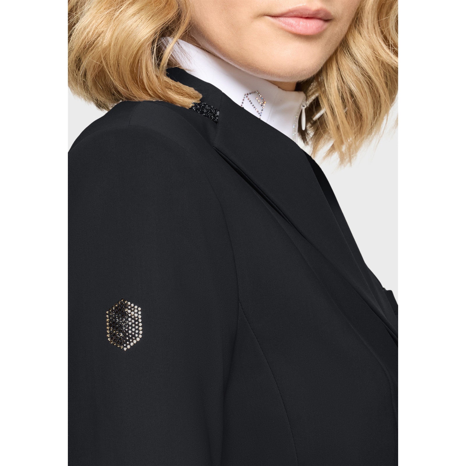Close-up side view of a female model wearing the black Samshield Victory Premium Show Jacket on a plain background