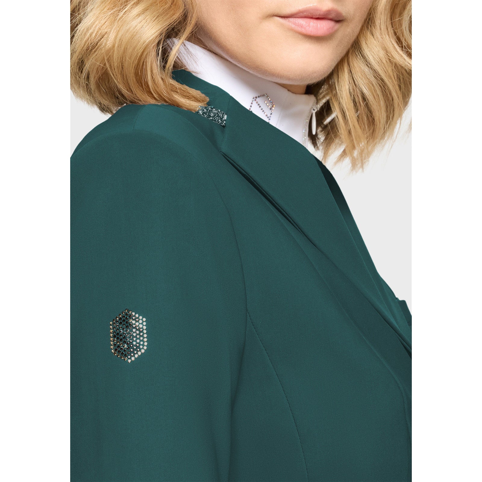 Close-up side view of a female model wearing the Hunter Green Samshield Victory Premium Show Jacket on a plain background