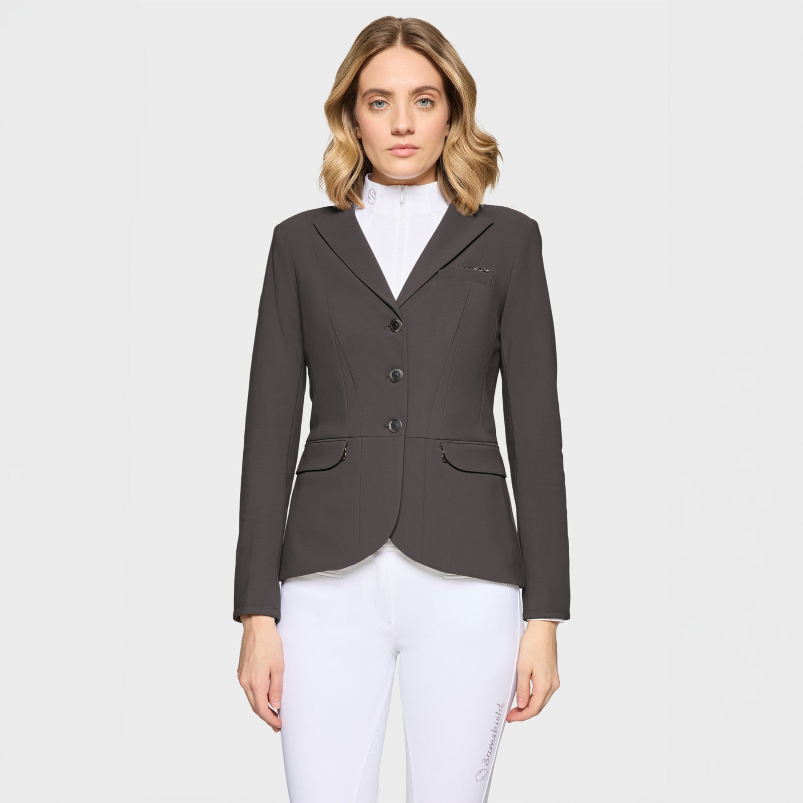 Front view of a female model wearing the Magnet Samshield Victory Premium Show Jacket on a plain background