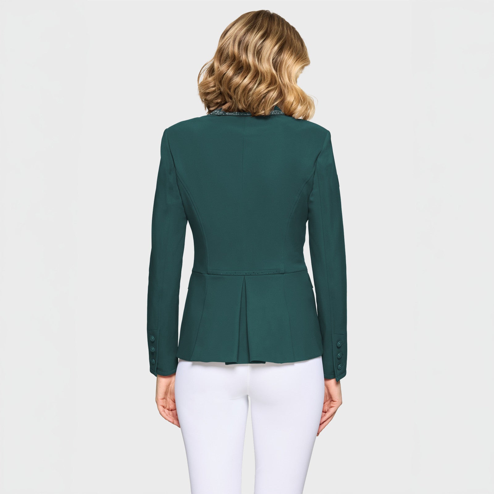 Back view of a female model wearing the Hunter Green Samshield Victory Premium Show Jacket on a plain background