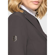Close-up side view of a female model wearing the Magnet Samshield Victory Premium Show Jacket on a plain background
