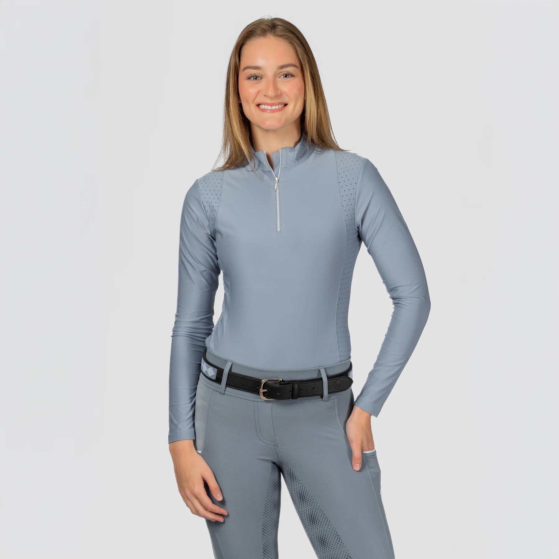 Front view of a model wearing Dusk Blue Equinavia Aurora Long Sleeve Training Shirt on a plain background