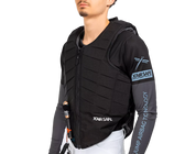 Angled front view of a male model wearing the Freejump X'Air Safe Airbag on a white background