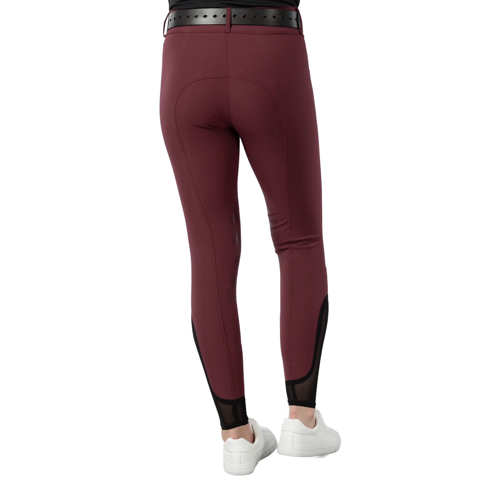 Back view of a model wearing the wine red Equinavia Maud Knee Patch Breeches on a white background
