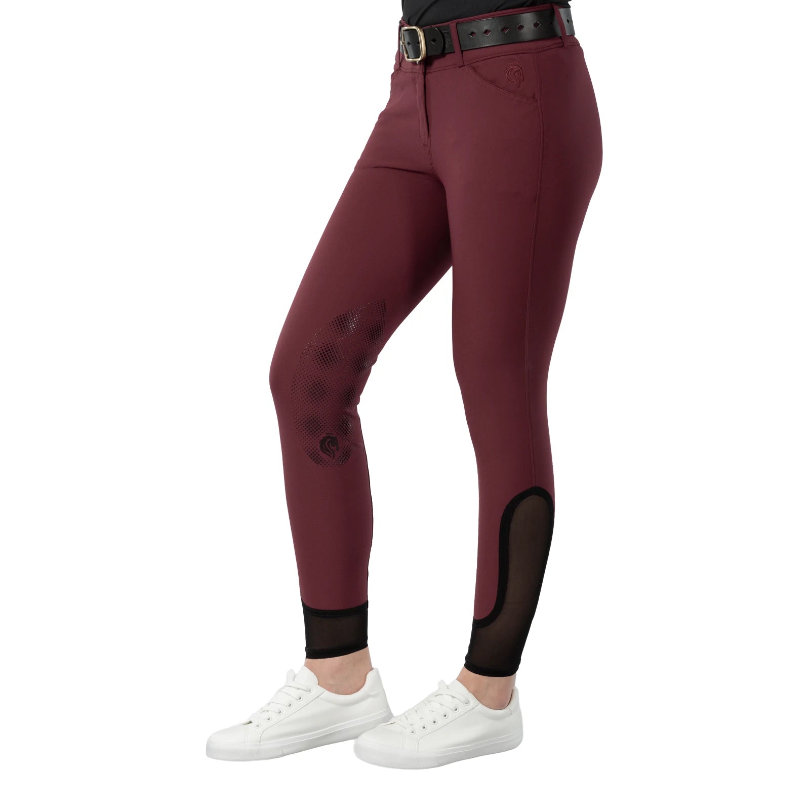 Side view of a model wearing the wine red Equinavia Maud Knee Patch Breeches on a white background