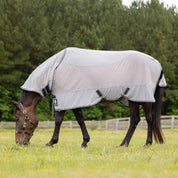 Horse grazing in a field wearing Equinavia Chill Summer Protector Sheet in slate grey